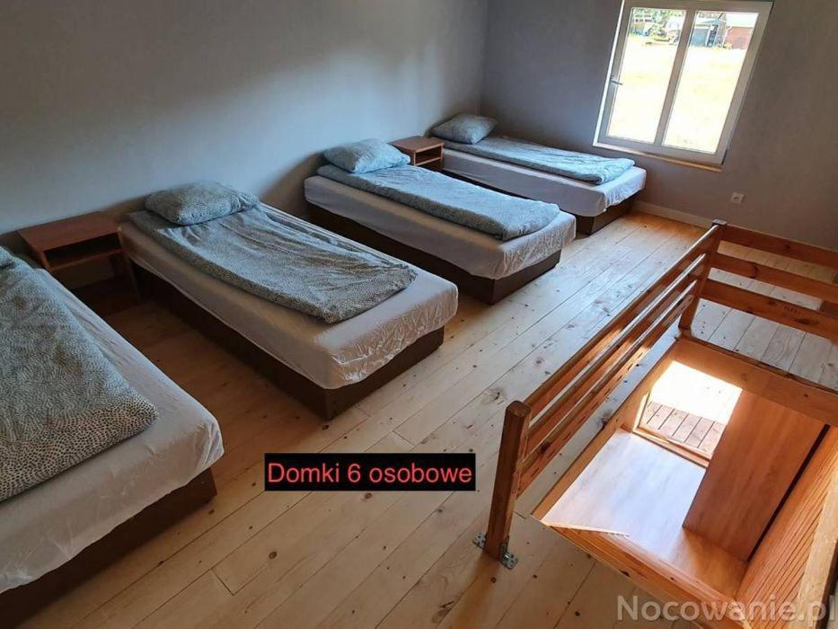 Domki Pod Lasem Mrzeżyno Buitenkant foto